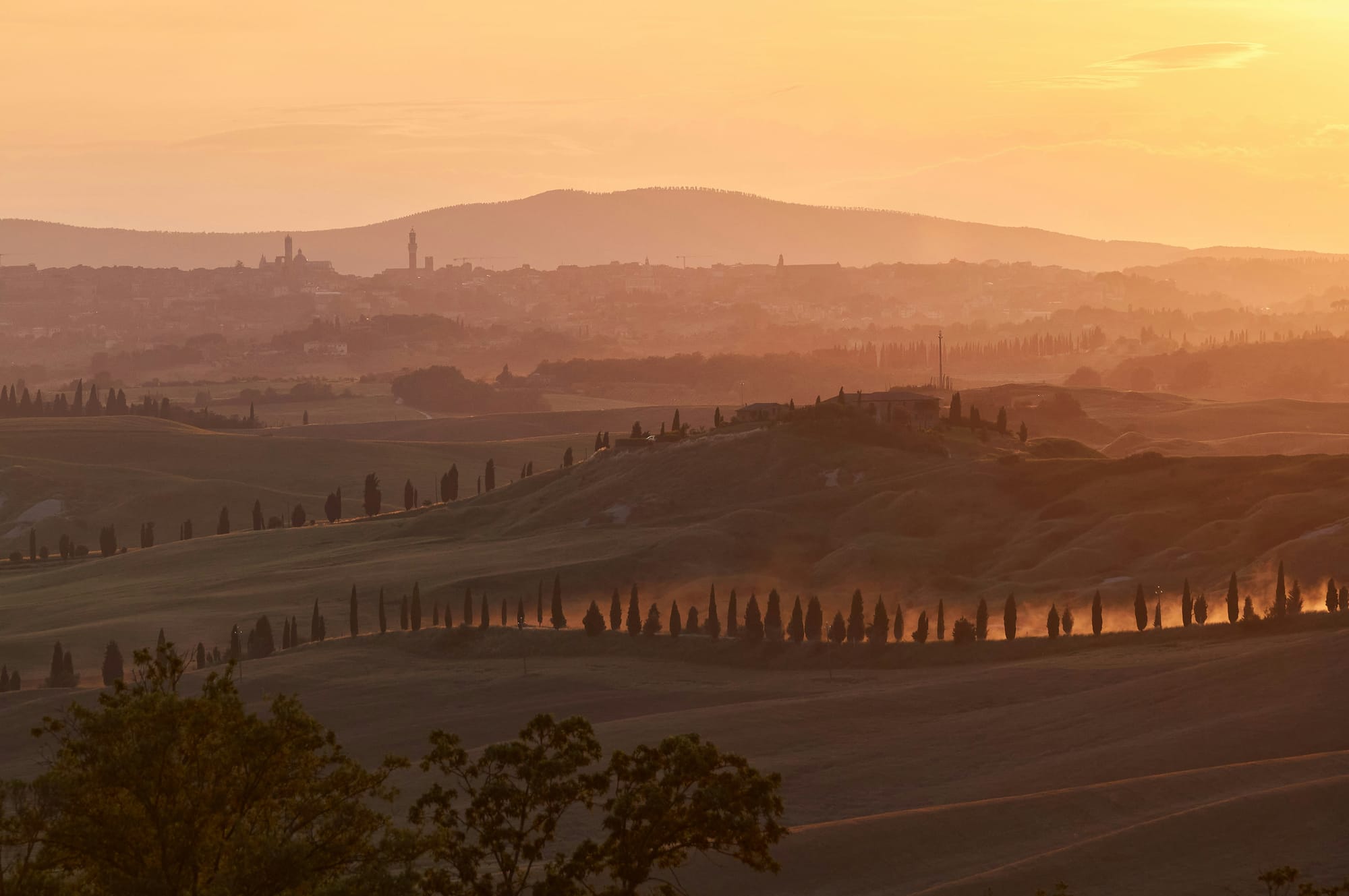 The enchanting Tuscan hills surrounding Siena, Italy.