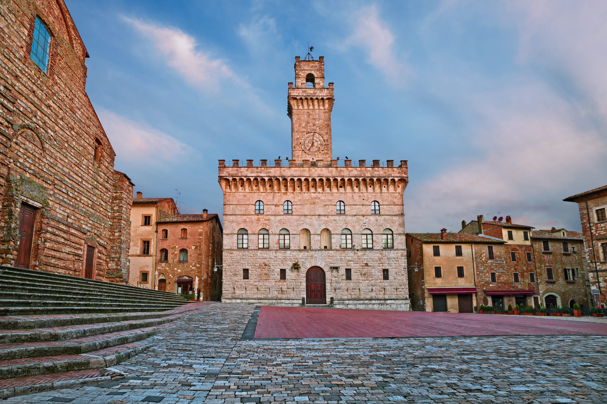 The medieval Palazzo Comunale and other historic buildings on Piazza Grande, the main square of Montepulciano in Tuscany.