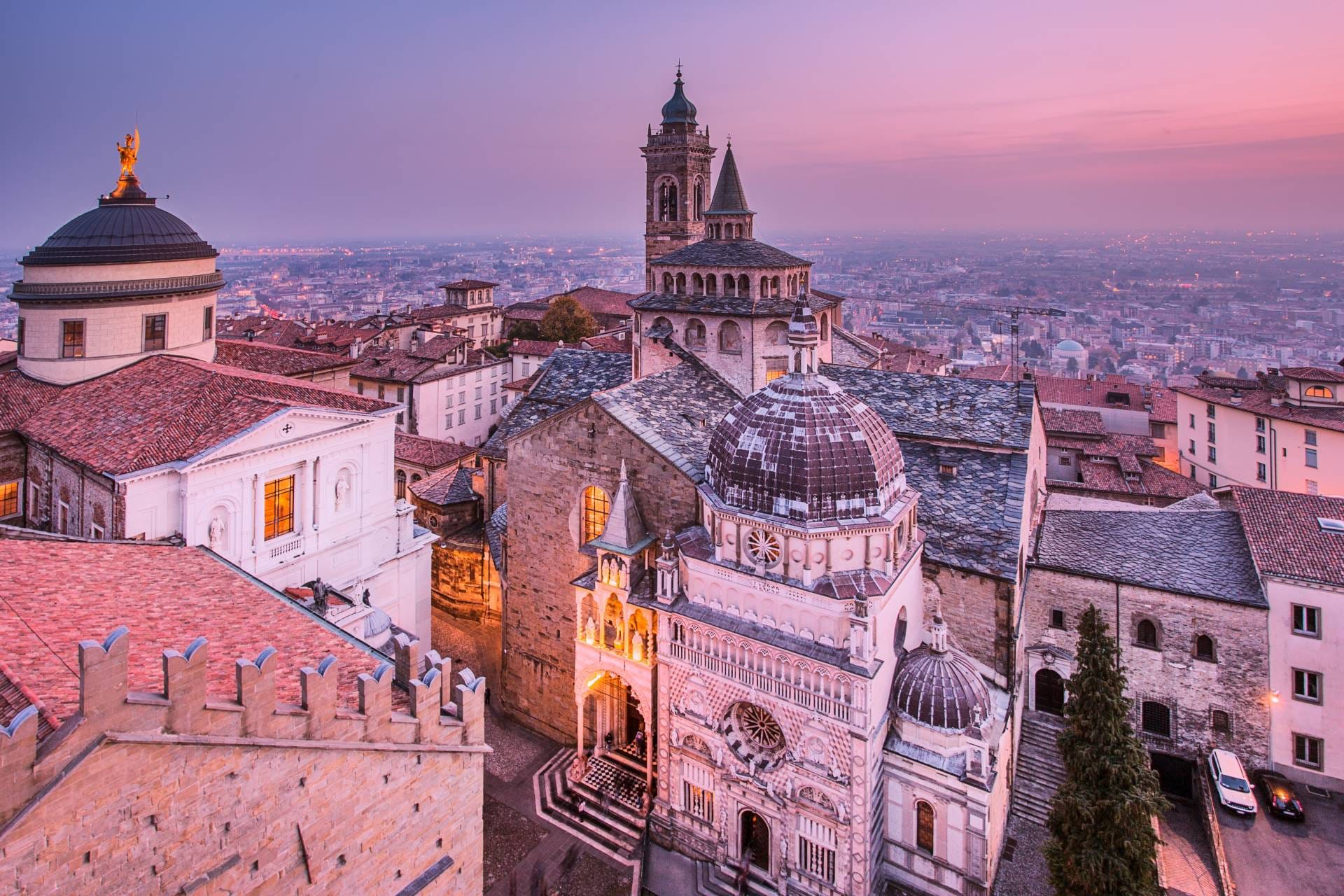 Aerial view from the Campanone in Bergamo featuring the Duomo, Colleoni Chapel, and Basilica of Santa Maria Maggiore.