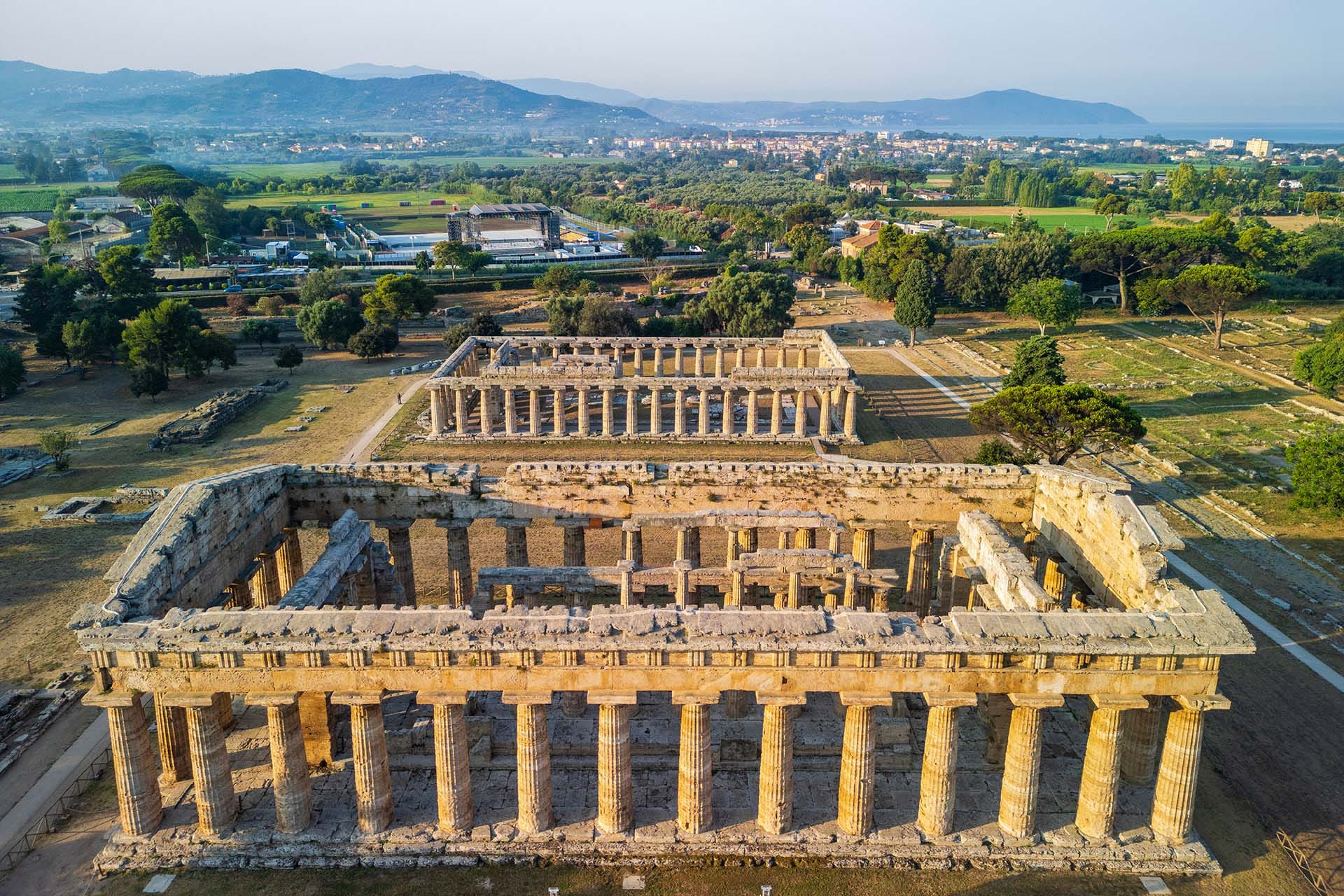 Aerial view of the UNESCO-listed Greek temples of Paestum in Campania, Italy — start location of Giro d'Italia 2026 Stage 6 to Naples