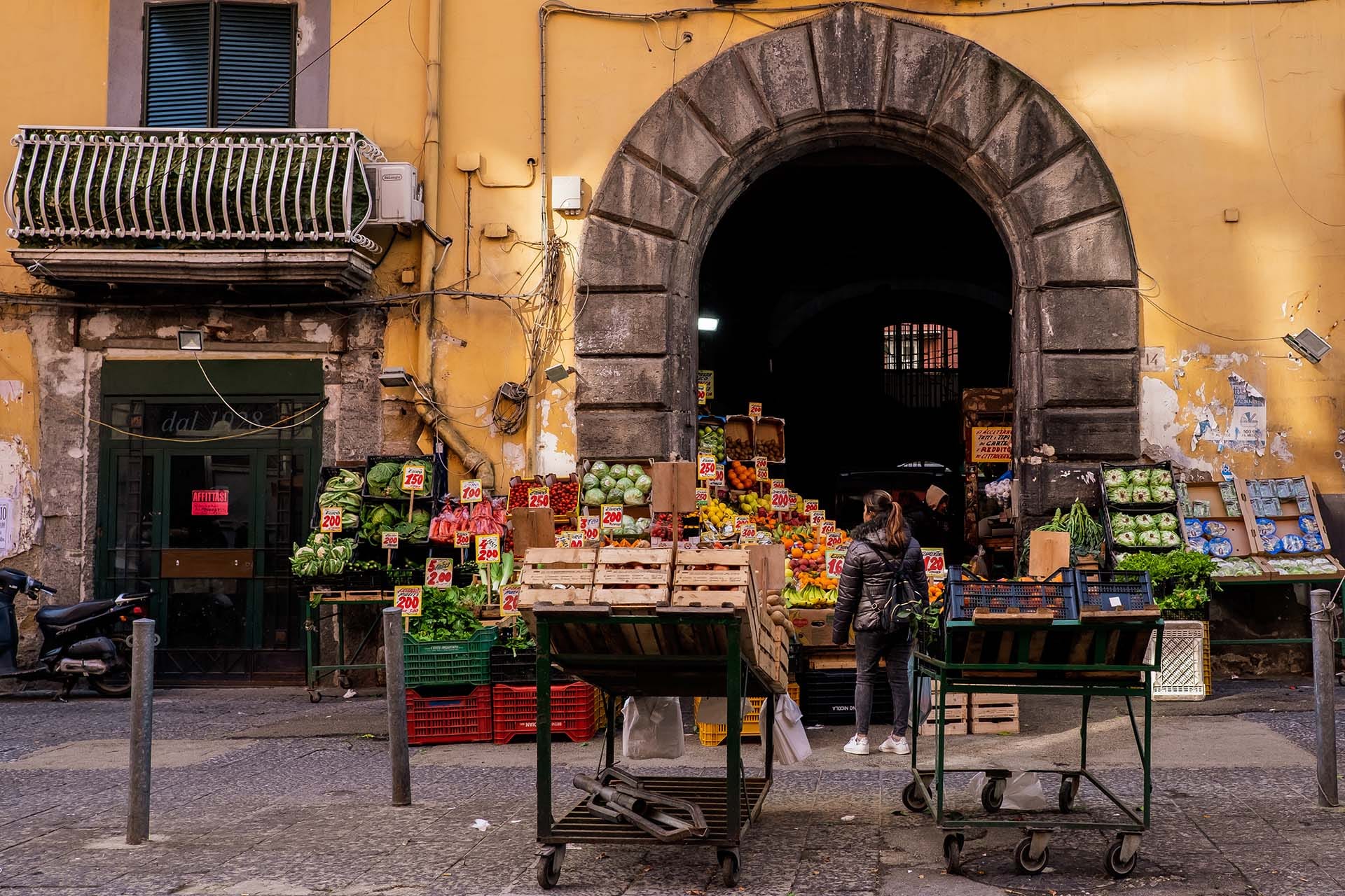 Traditional fruit and vegetable street vendor in the historic center of Naples, Campania, Italy