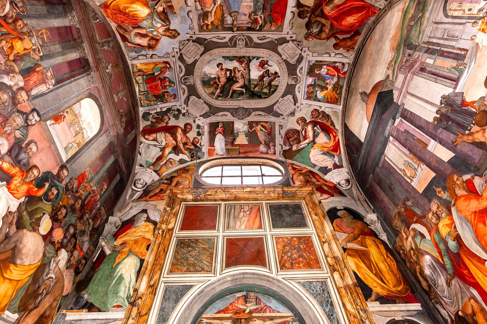 Low-angle view of the Mannerist frescoes by Alessandro Allori in the Cappella Montauti, Basilica della Santissima Annunziata, Florence, Italy.