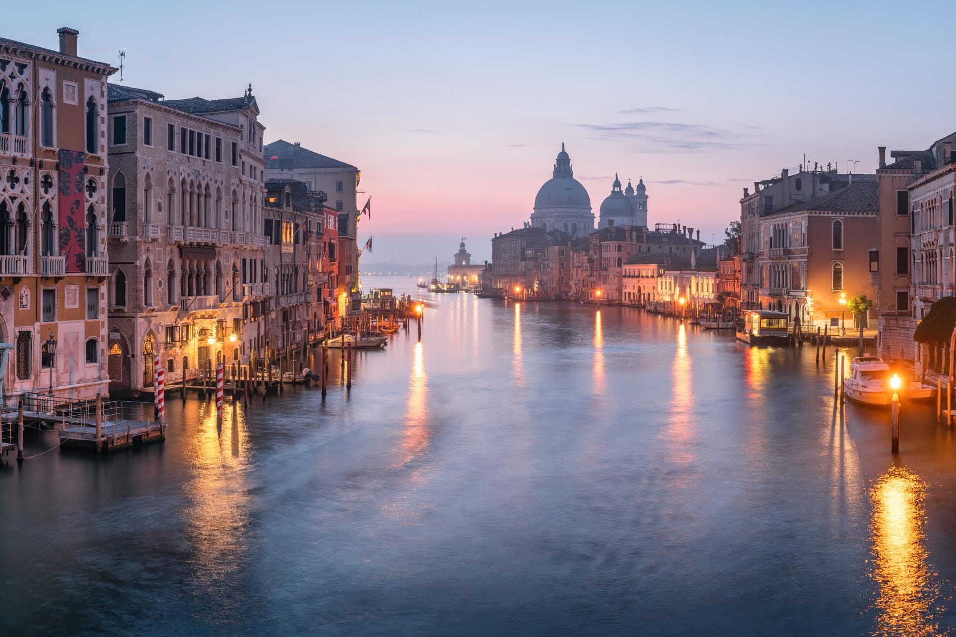 Grand Canal at dusk with the dome of Santa Maria della Salute in Venice