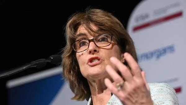 RBA holds cash rate at 4.35 per cent and hardens language on inflation risk