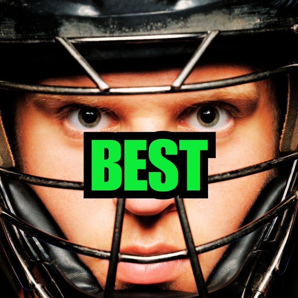 A person wearing a catcher's helmet with the Rawlings logo