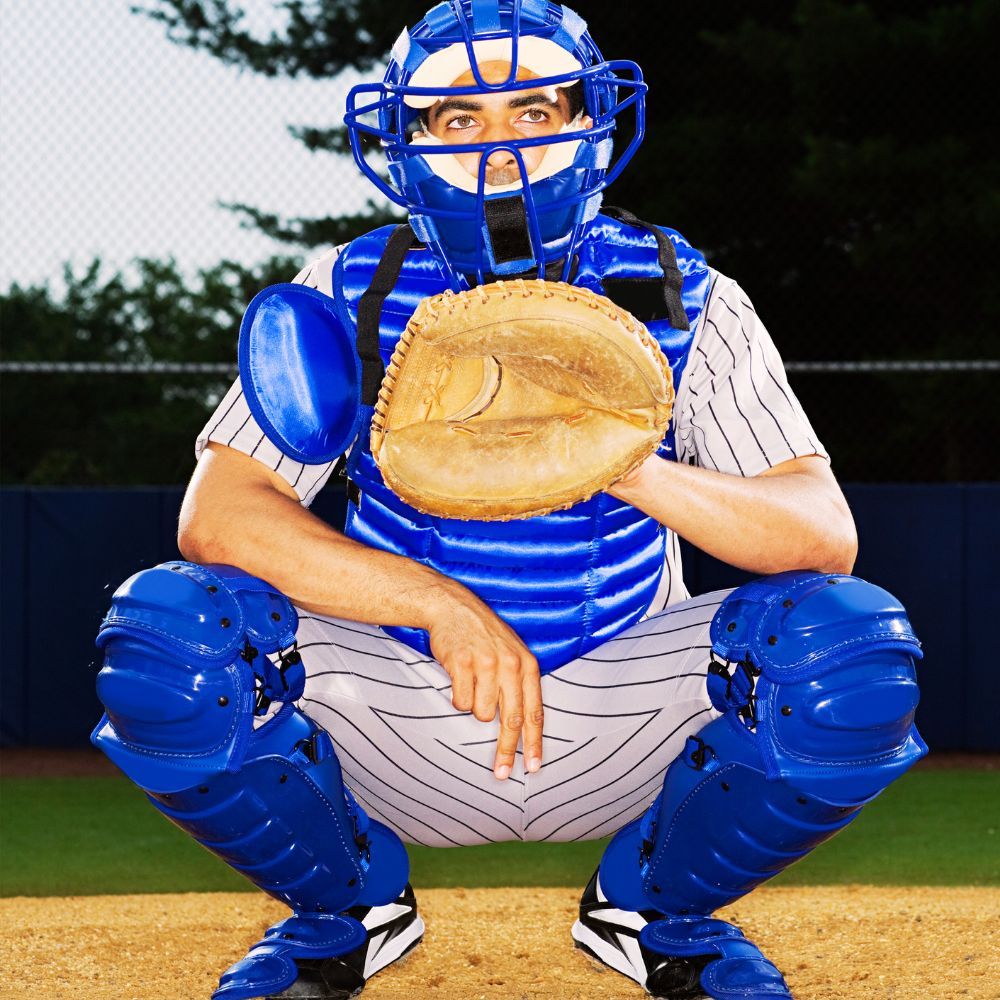 A baseball helmet with two ear flaps and a chin strap