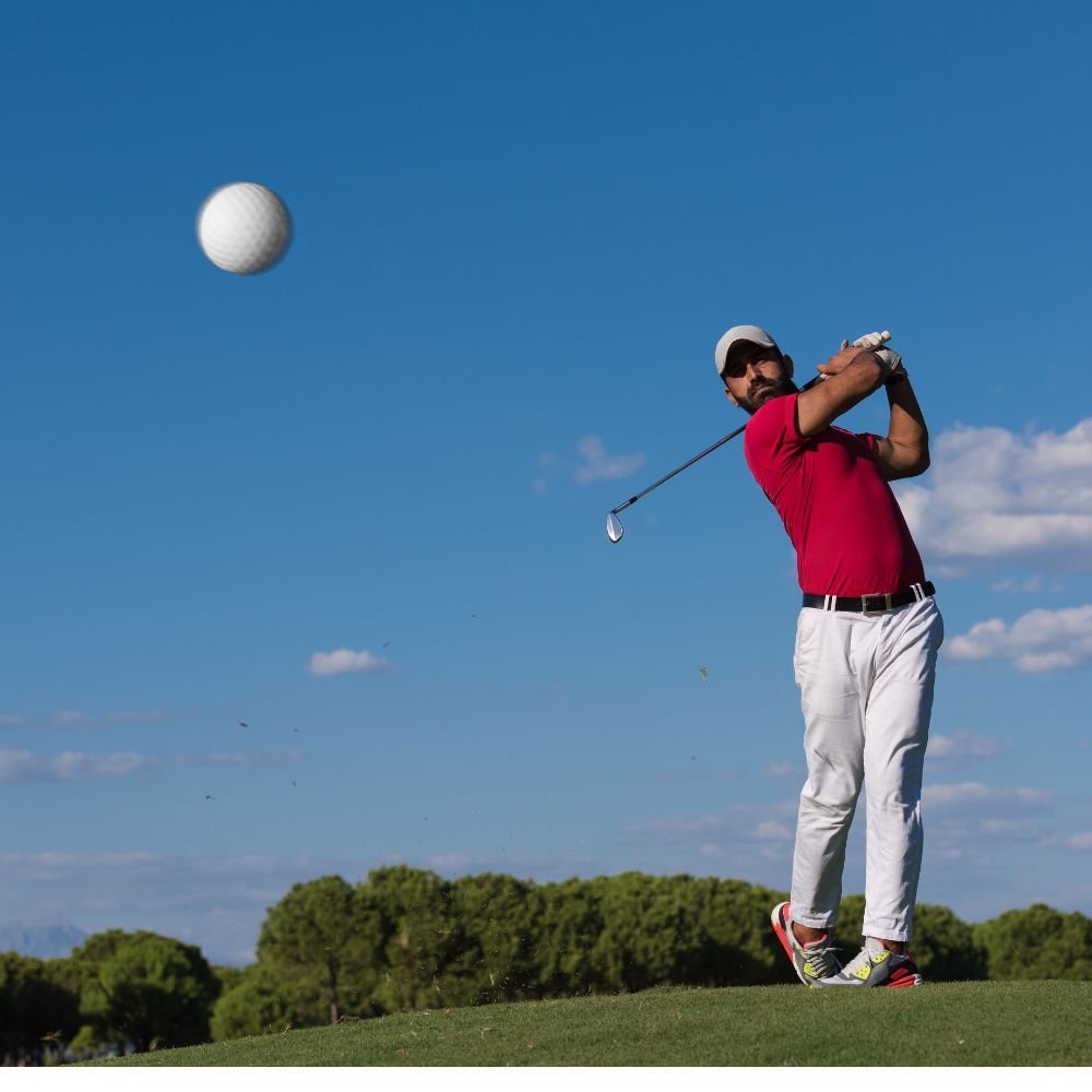 A picture of a golfer swinging Callaway Epic Forged Irons