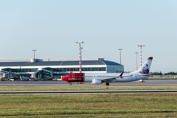 Norwegian cuts first-quarter operating loss by two-thirds and beats analyst consensus