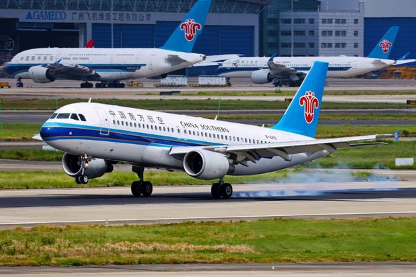 An Airbus A320 aircraft operated by China Southern Airlines lands in Guangzhou Baiyun airport