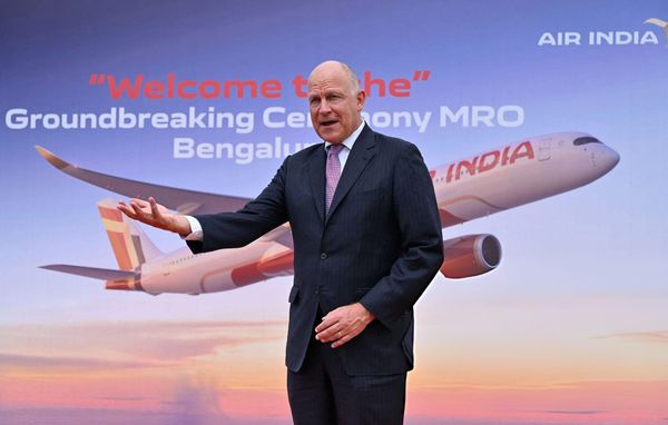 Campbell Wilson gestures during its groundbreaking ceremony of maintenance, repair, and overhaul (MRO) aircraft facility