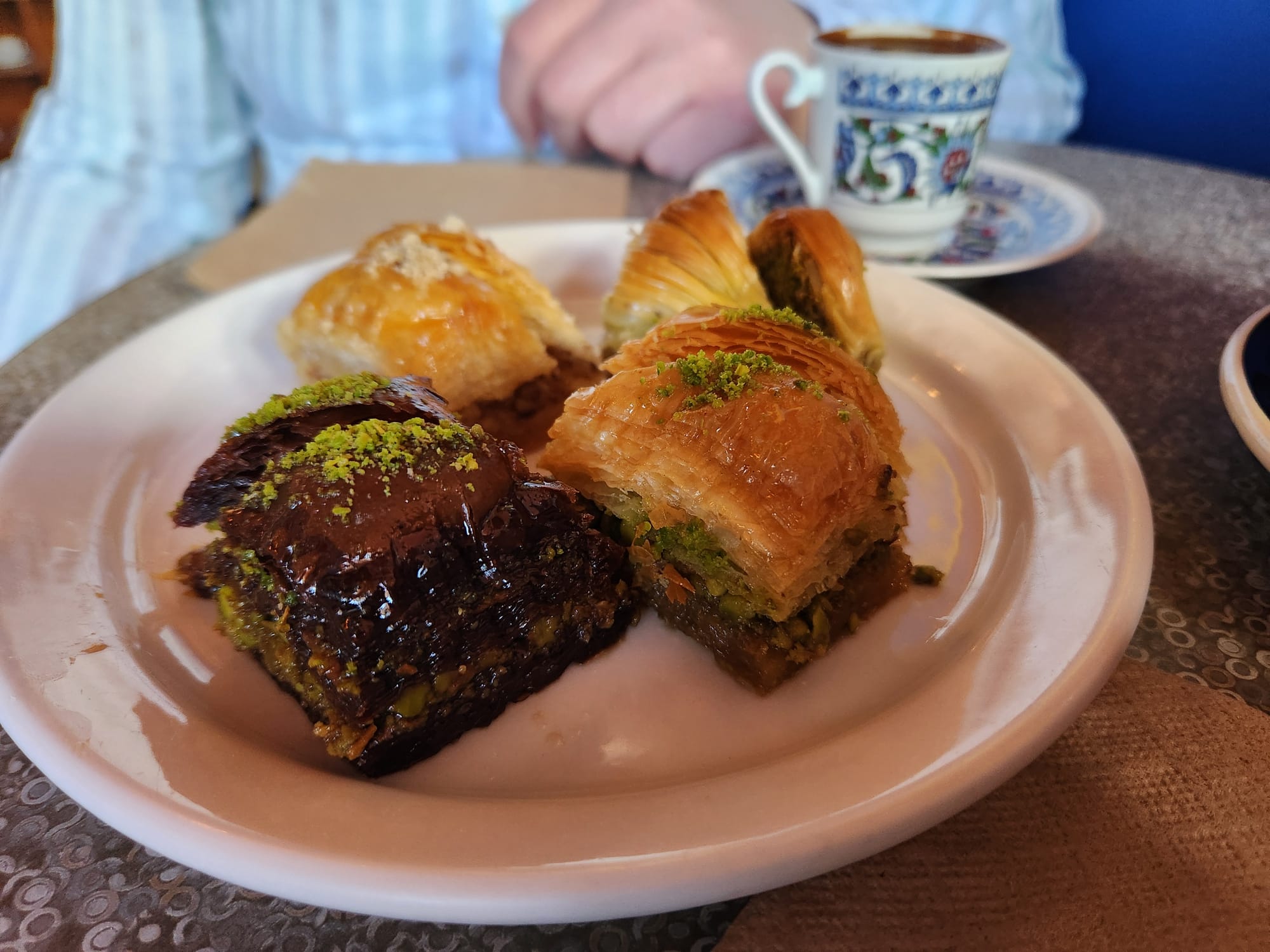 A plate with an assortment of baklava. 