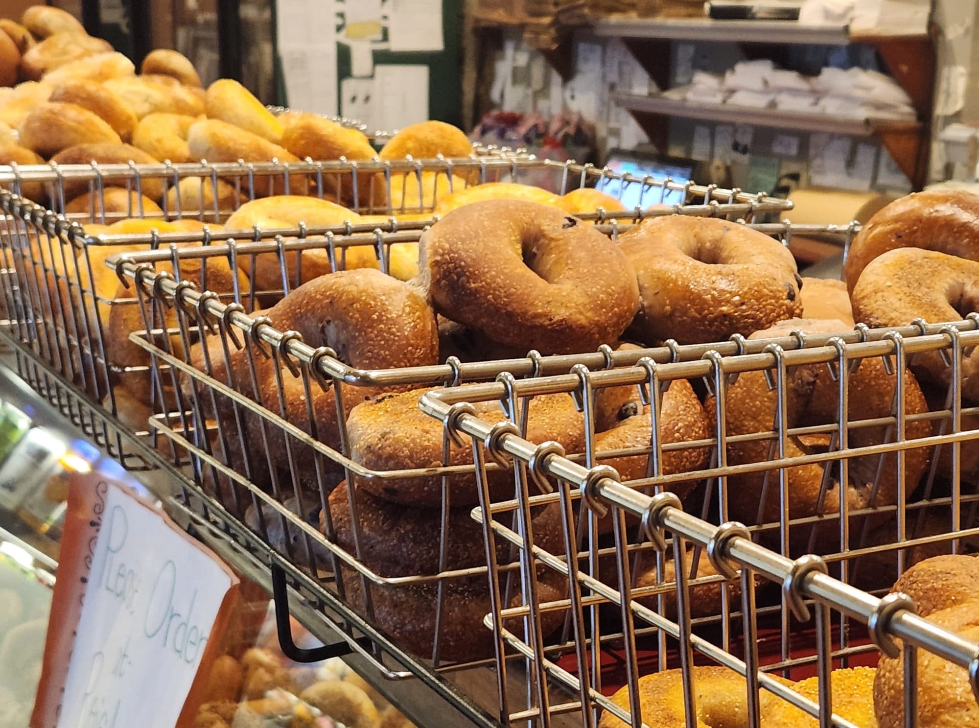 Baskets of fresh bagels at The Bagelry.