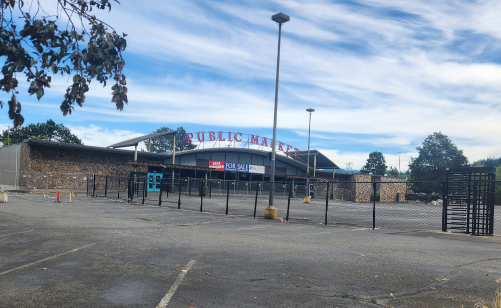 A "Sale Pending" banner was added to the vacant Bellingham Public Market site at Cornwall Avenue & York Street.