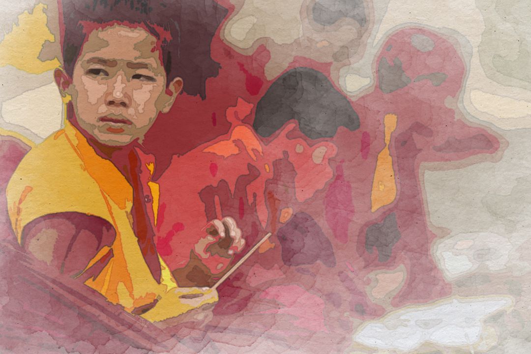 selective focus photography of boy sitting in round