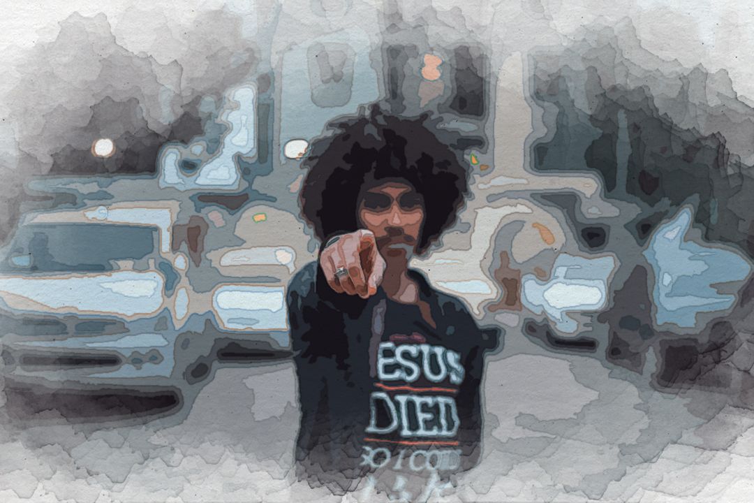 man pointing finger in front of camera