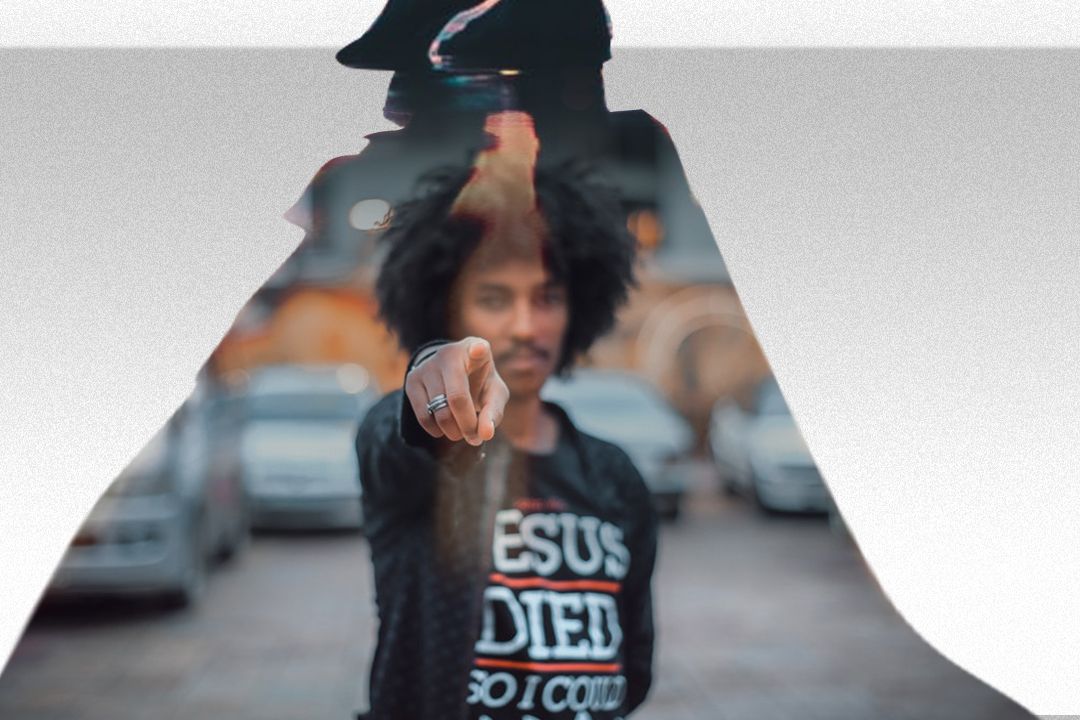 man pointing finger in front of camera