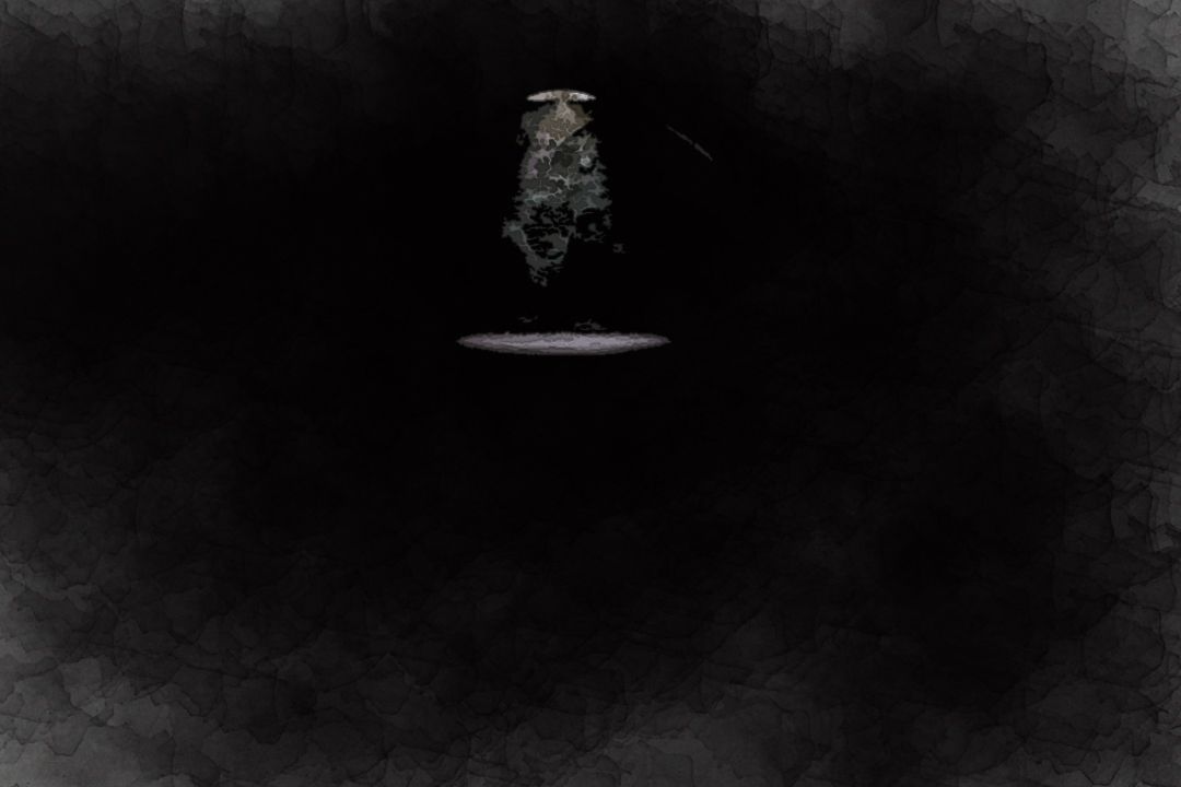 A spotlight coming from a hole in a dark underground cave in Minorca