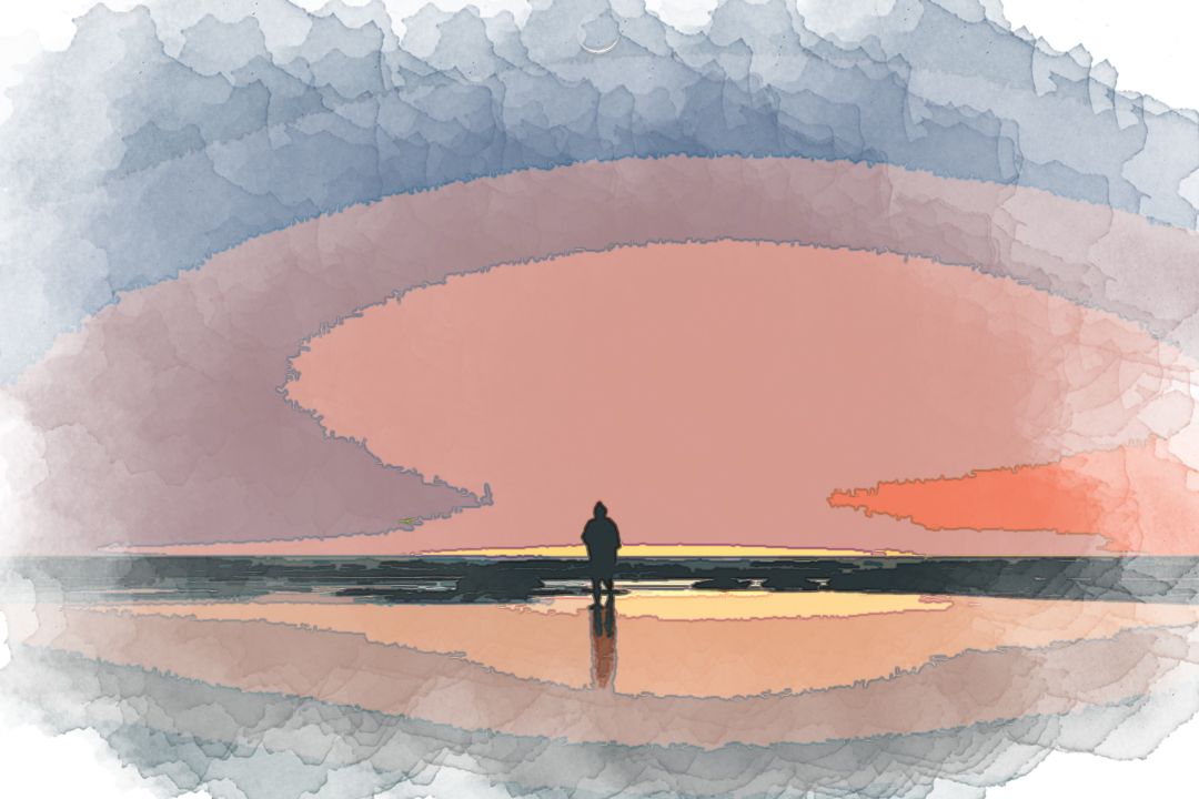 silhouette of man standing on seashore