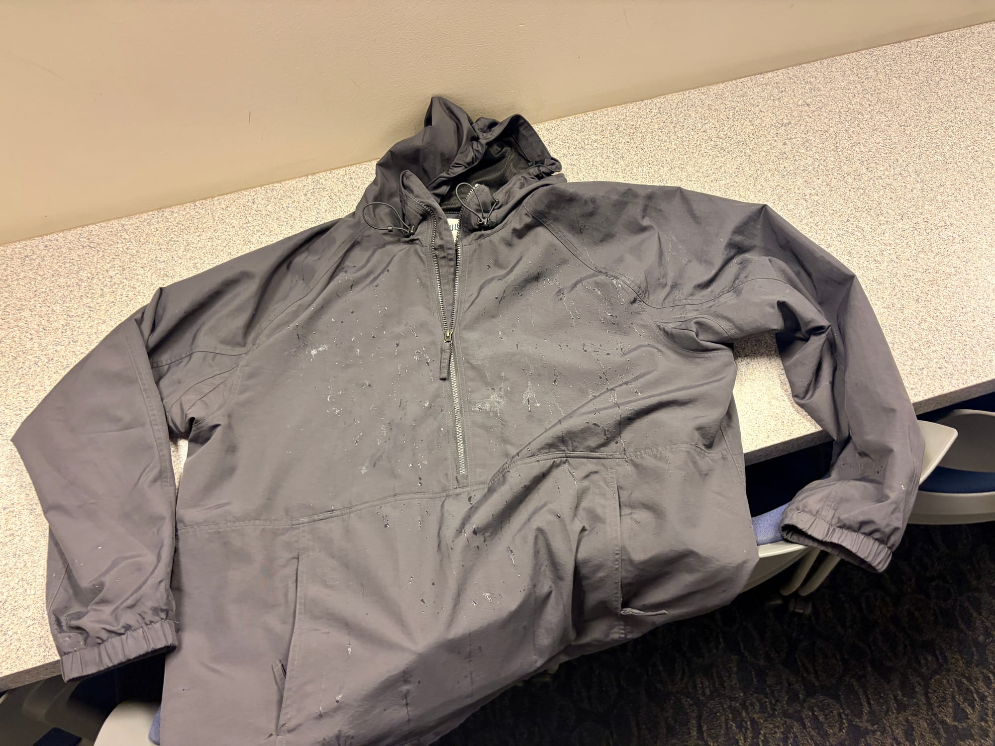Champagne-spattered poncho