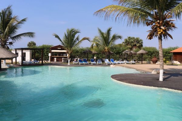 Lanzarote poolside on a sunny day with palm trees
