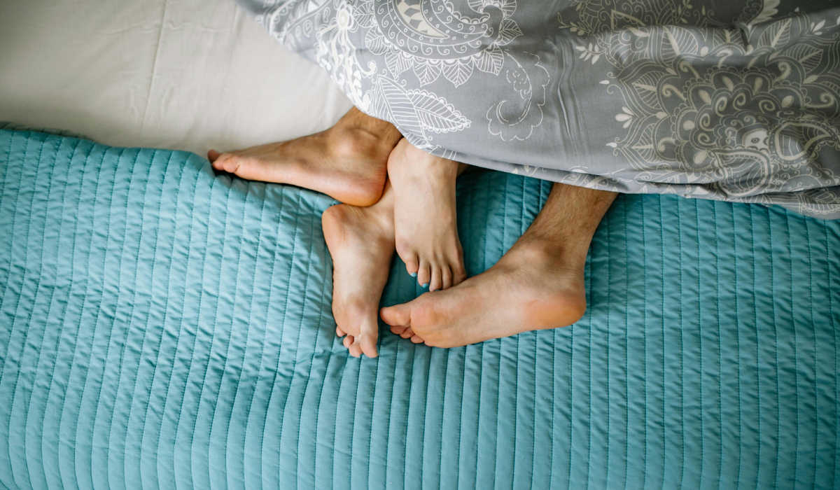 Feet in bed