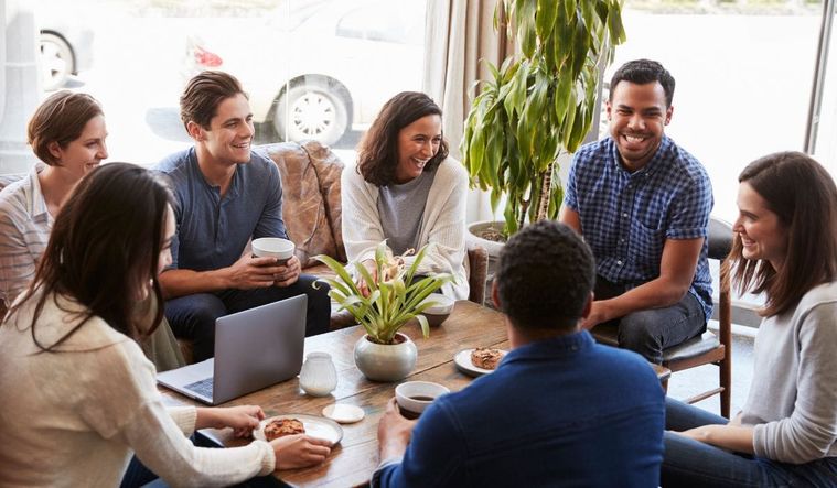 A group of people chatting.