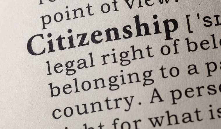 Photo of the word citizenship with the definition in the dictionary.