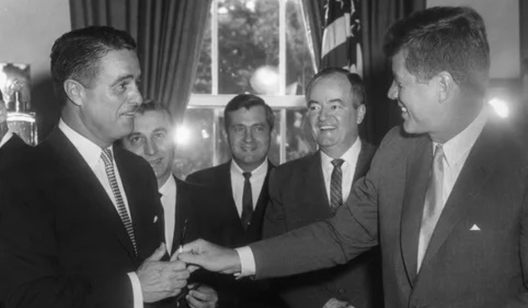 President John F. Kennedy and Sargent Shriver establishing the Peace Corps