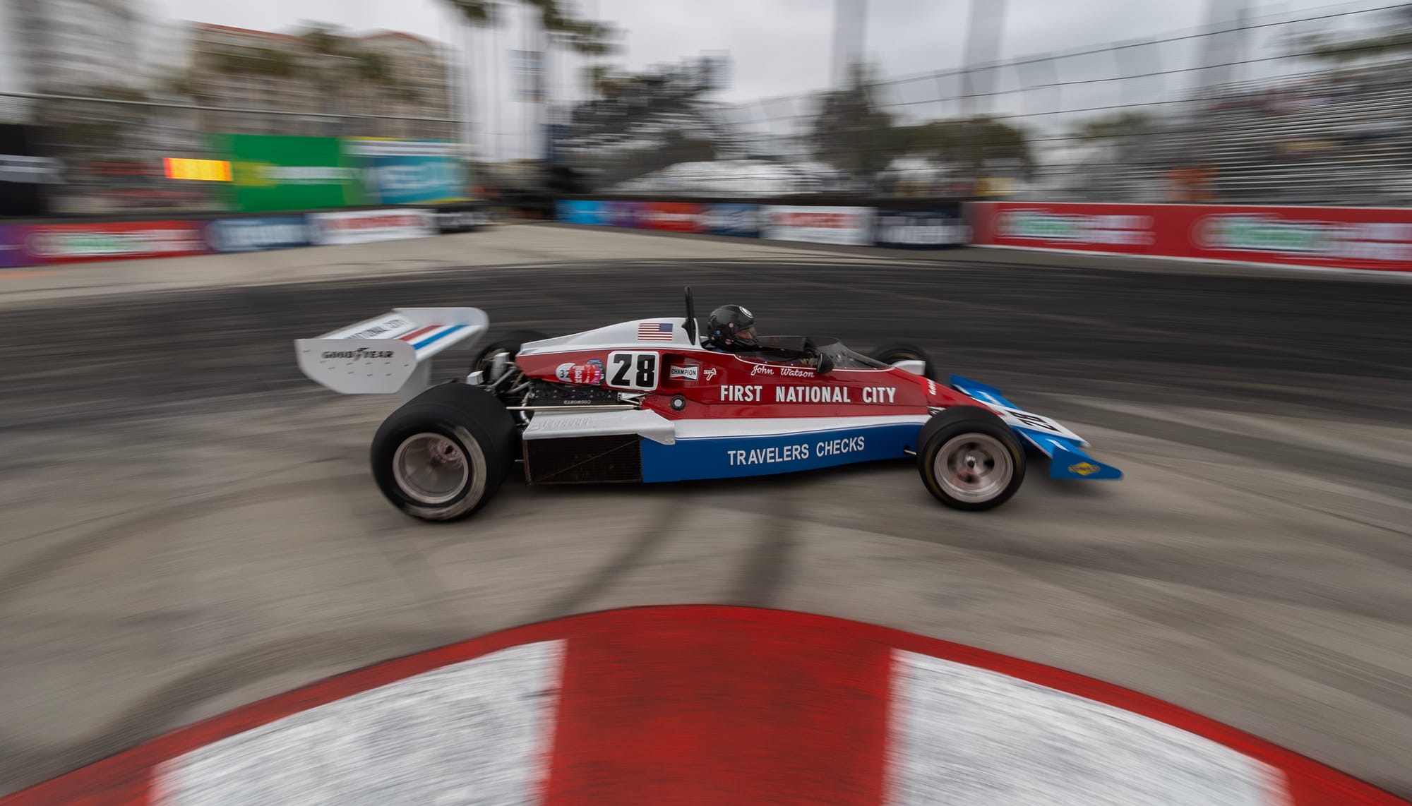 A red, white and blue race car.