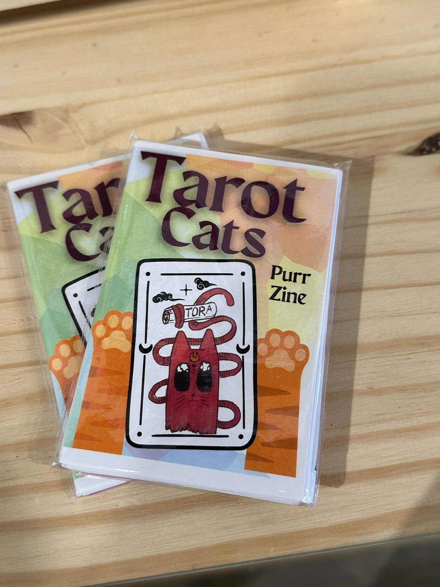 A couple zines titled "Tarot Cats."