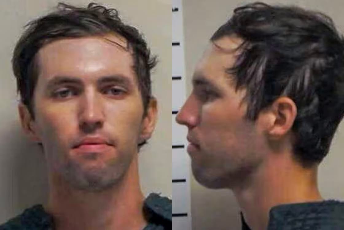 Booking photos of a young man's face and profile.