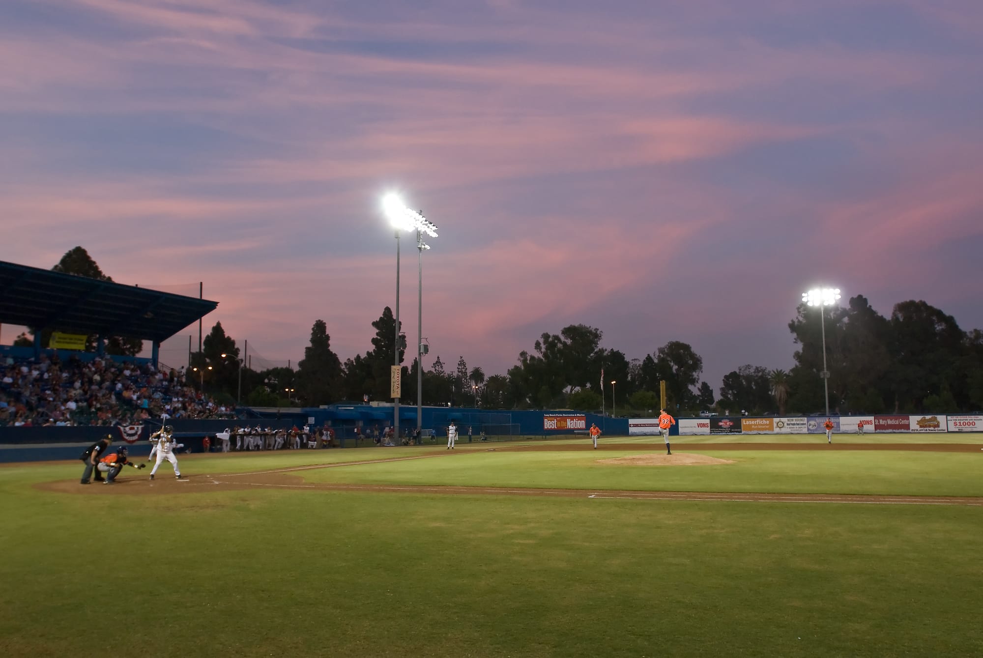 Sunset at a baseball field.