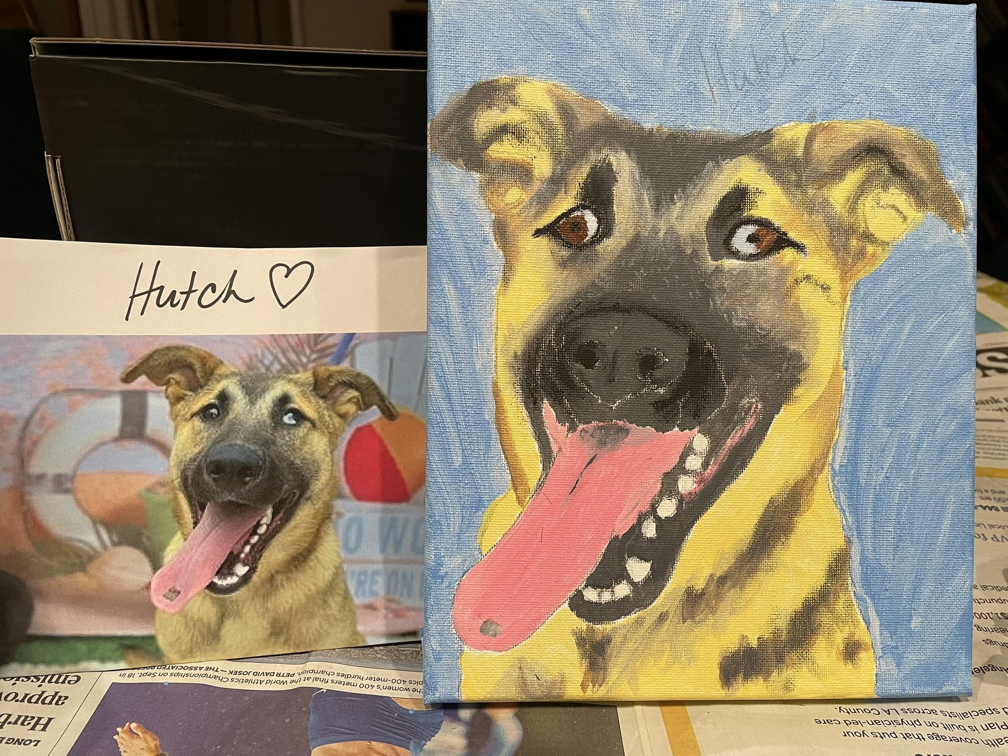A portrait of a dog stands next to a nearly identical photo of the dog.