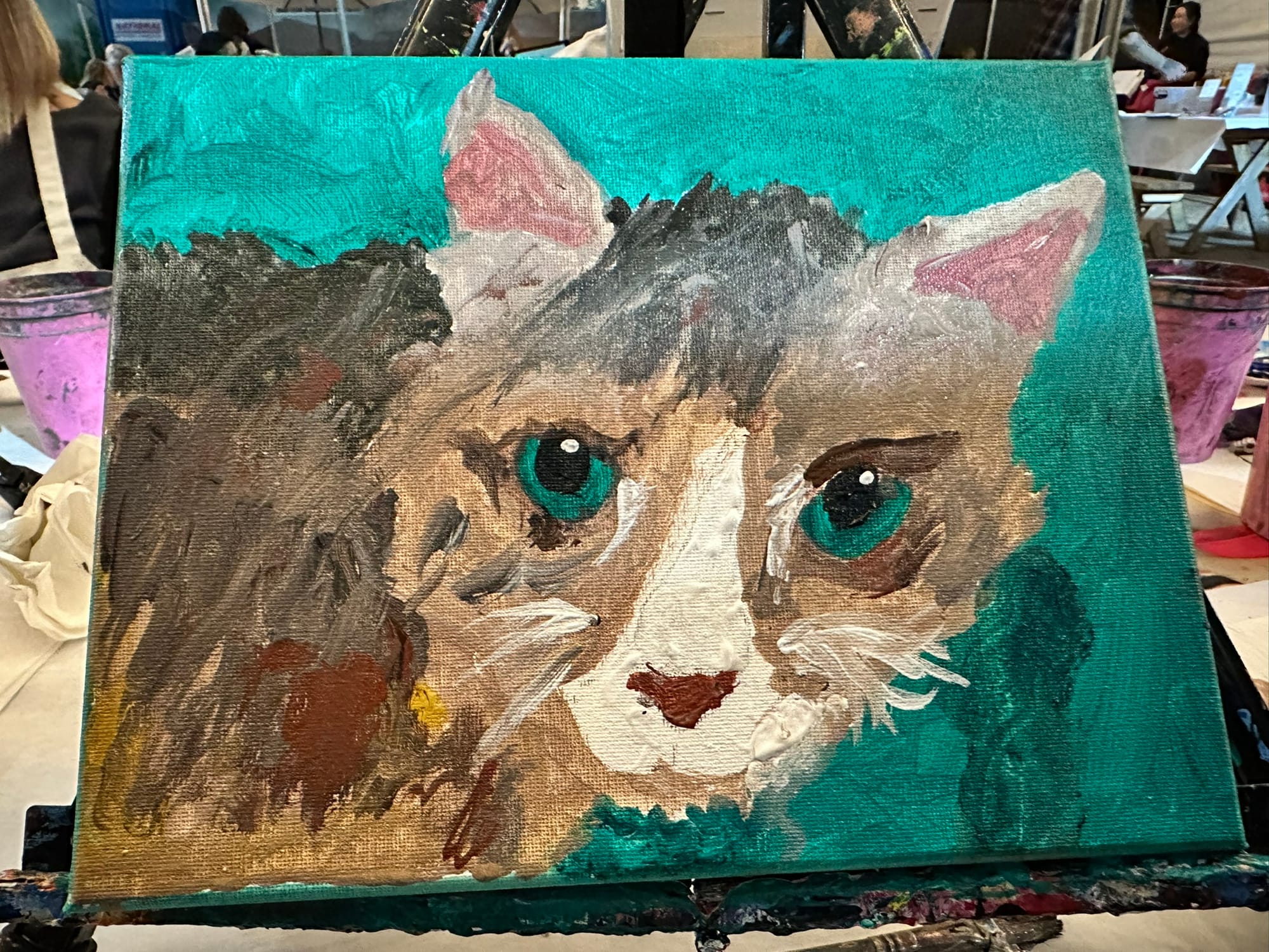 A painting of a cat. 