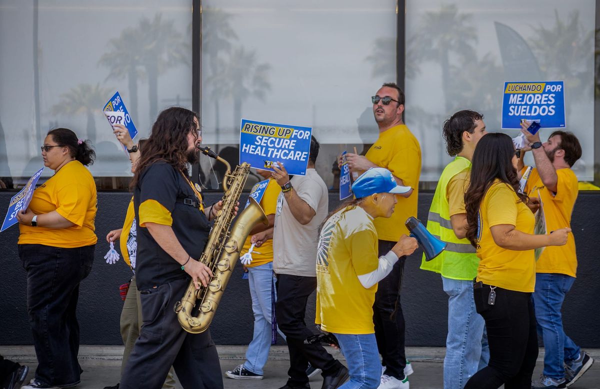 Dozens of grocery workers rally at Marina Pacifica Ralphs