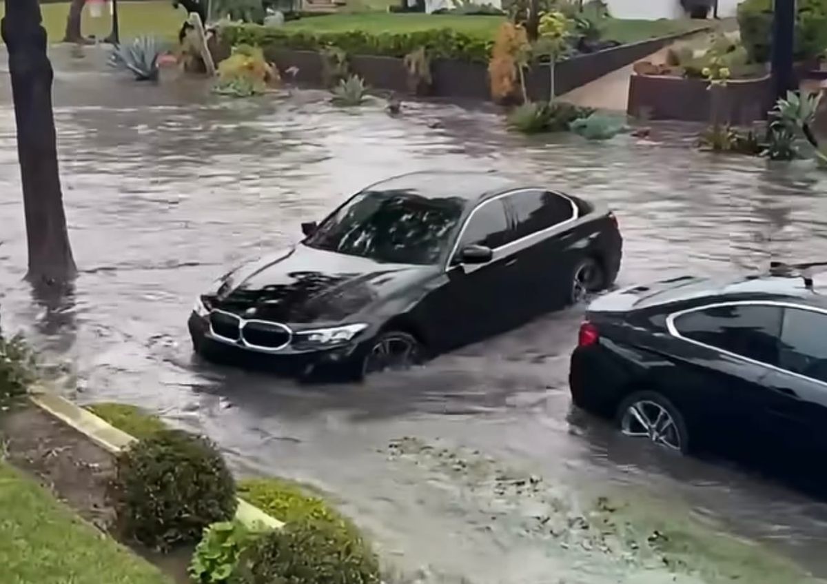 Why does Long Beach flood during rainstorms?