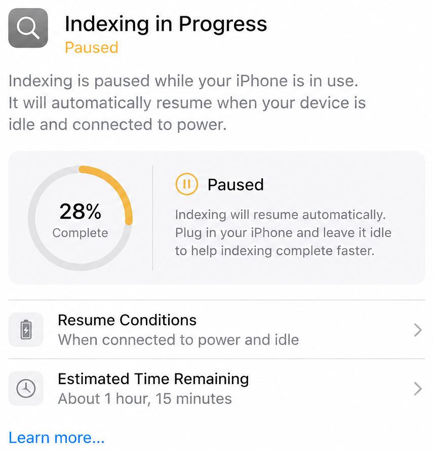 Concept illustration of an enhanced iOS indexing status screen showing indexing paused at 28% completion. The interface explains that indexing is paused while the iPhone is in use and will automatically resume when the device is idle and connected to power. Additional sections display resume conditions and an estimated remaining time of 1 hour and 15 minutes.
