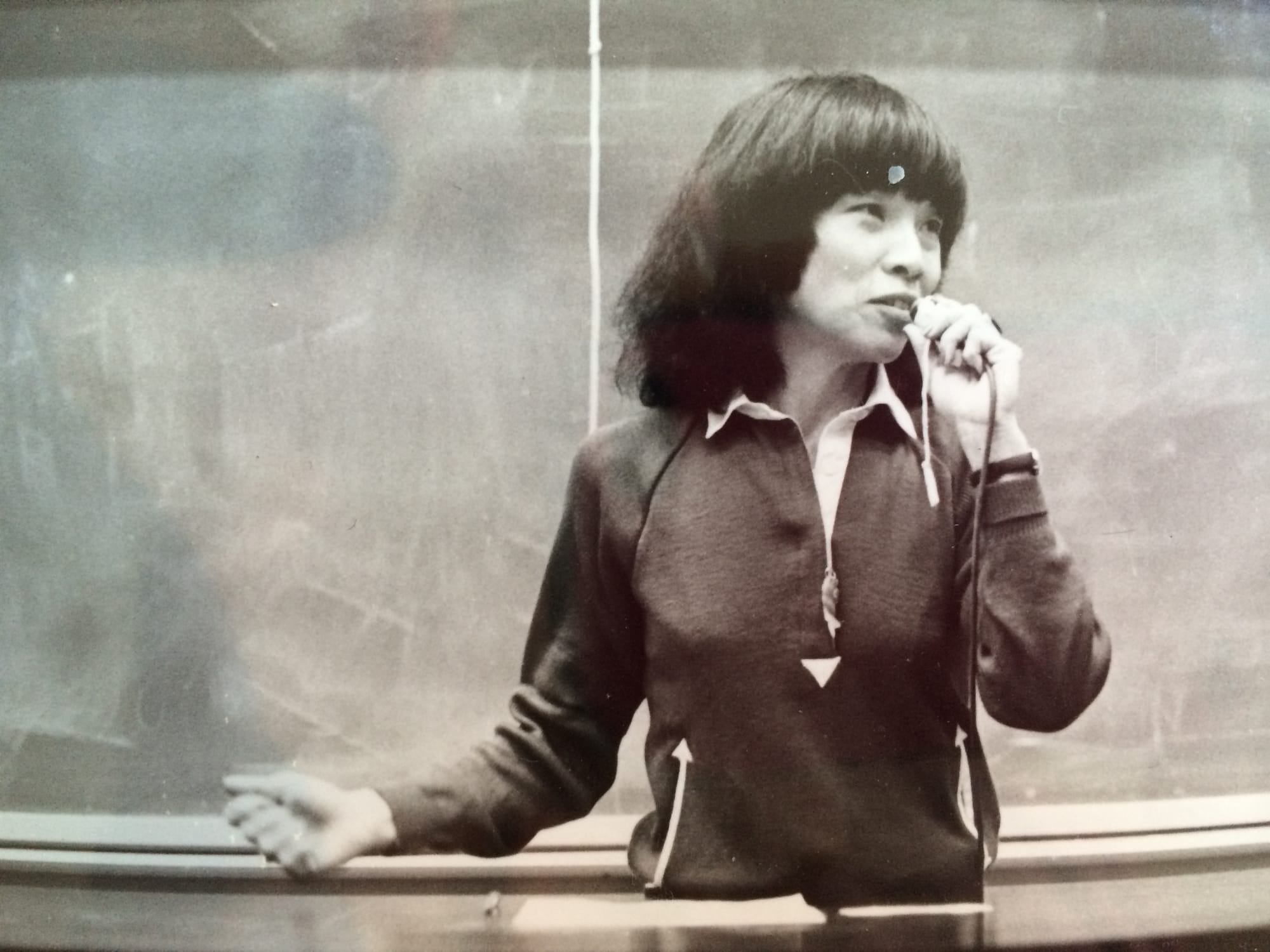 Elaine teaching in front of chalkboard at UC Berkeley, 1977