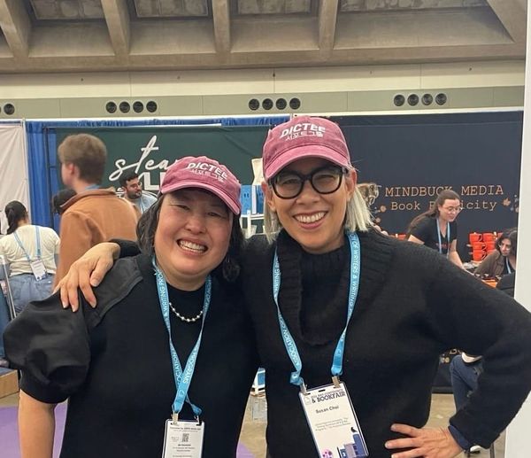 Margaret and Susan in Dictee Support Group hats. 