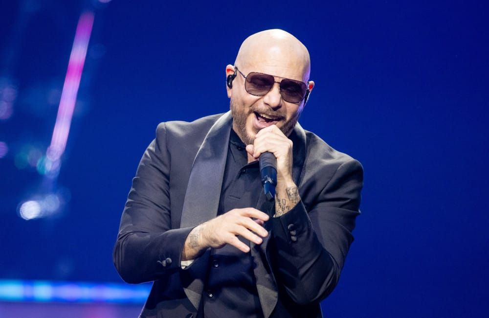 Pitbull über Dolly Parton: 'Sie glaubte an mich, als viele andere es nicht taten'