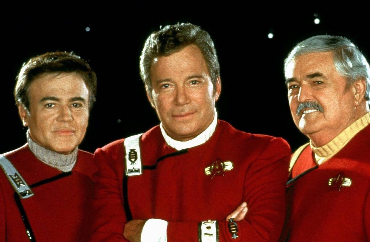 Walter Koenig (l.), William Shatner und James Doohan (r.) im Jahr 1994.