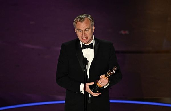 Christopher Nolan accepts the award for Best Director at 96th Oscars - Getty