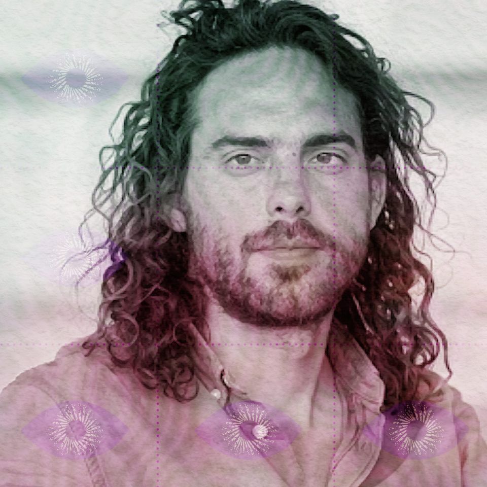 Portrait of Chris Timmermann with long dark curly hair and a beard, gazing calmly at the camera, in a pale pink-and-grey wash.
