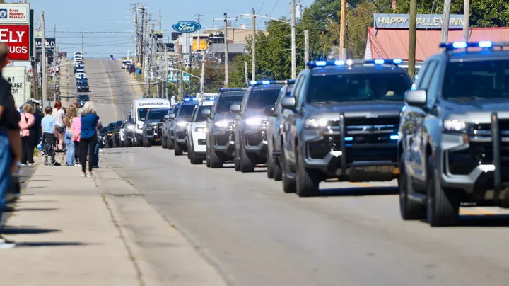 Community lines route as fallen trooper is brought home to Glasgow