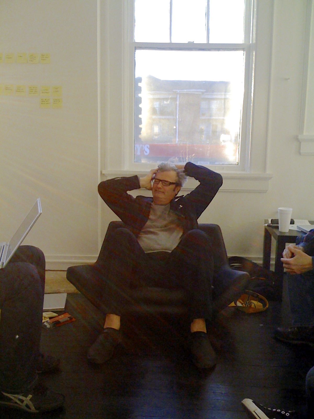 Burney fixing his hair after breaking a chair at the old office. This office was upstairs at the corner of Glenwood Ave and Hillsborough St across the street from Snoopy's (2009).
