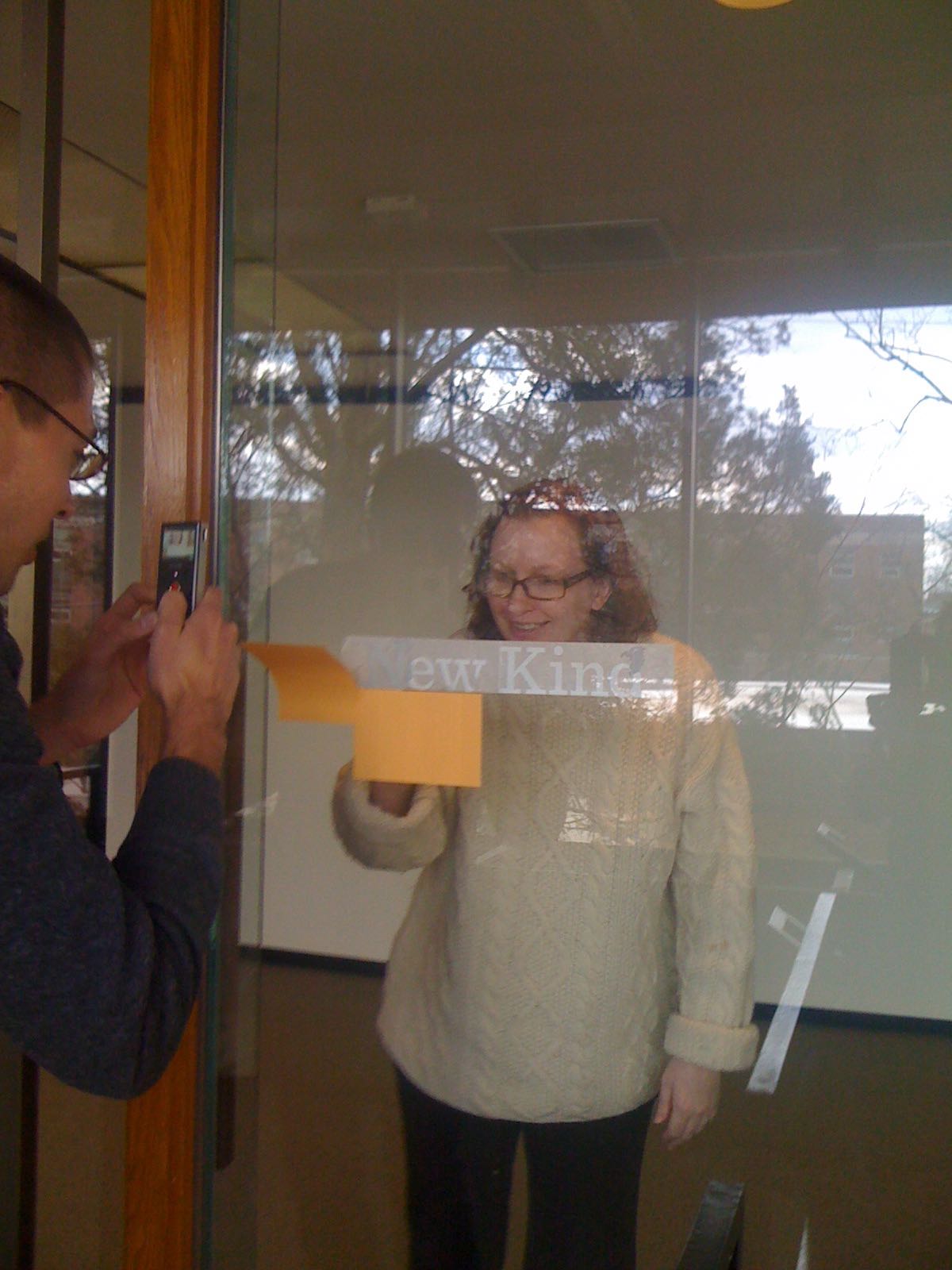 Elizabeth and Matt adding our name to the door (2010).