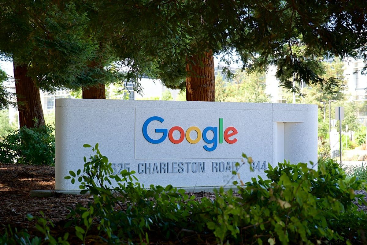 A white sign with the Google logo and address on Charleston Road in Mountain View