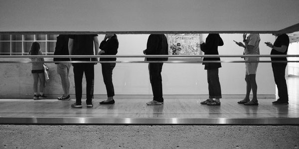 People standing in a line, waiting