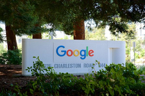 A white sign with the Google logo and address on Charleston Road in Mountain View