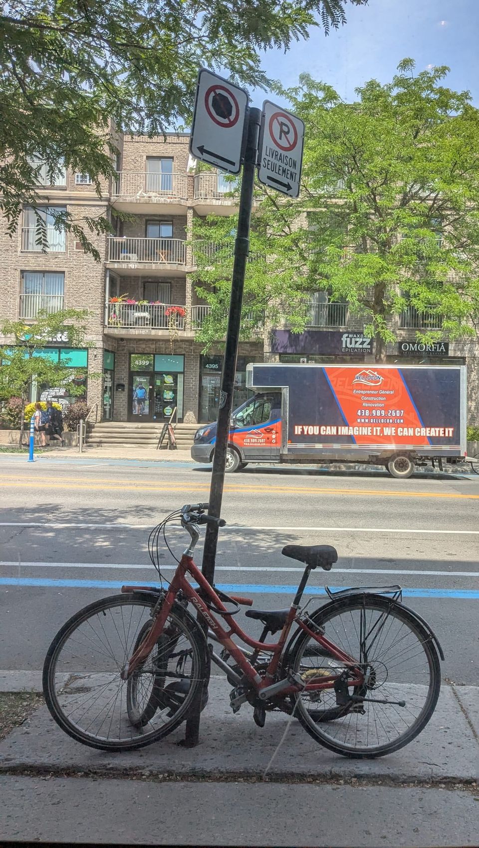 photo: street scene: bicycle, contractor's truck: IF YOU CAN IMAGINE IT, WE CAN CREATE IT